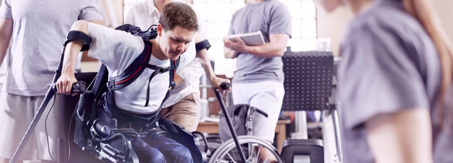 man learning to walk again after an accident